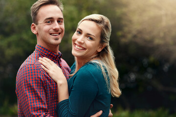 Obraz premium Smile, couple and portrait outdoor on date, vacation or bonding together on holiday to relax. Happy man, woman and hug in nature for love, romantic commitment and support of partner in New York