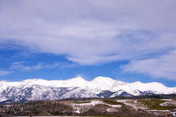 Snow Swept Mountains in the Distance