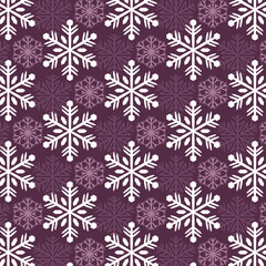 Seamless winter background with snowflakes. Snowflakes on a lilac background.