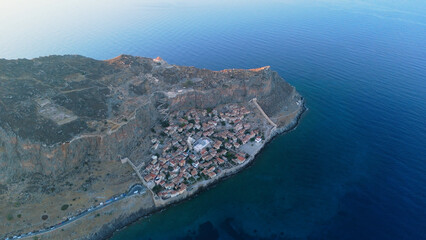 Fototapeta premium greece peloponnese historical peninsula monemvasia aerial view with sunrise and sunset lights