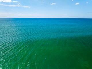 Fototapeta premium Sea surface aerial view,Bird eye view photo of blue waves and water surface texture Blue sea background Beautiful nature Amazing view sea background