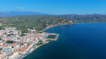 greece peloponnese region gytheio town lighthouse coastal houses chapel and boats aerial view