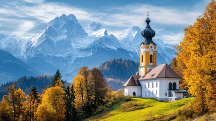 Fototapeta premium Church with onion dome in mountain valley, surrounded by autumn foliage
