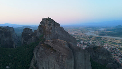 Aerial shot of monasteries built on unique rock formations in the Meteora region of Greece