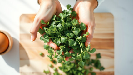 Fresh Parsley in Hand Over Wooden Cutting Board