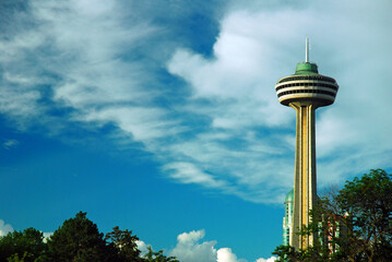 The Skylon Tower rises over the town of Niagara Falls, Ontario, and provides a view of the city and falls