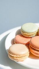 Obraz premium Macarons on a White Plate