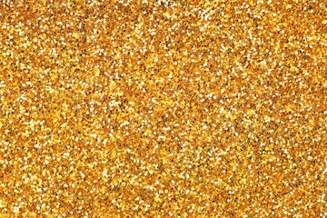 Beautiful shiny golden glitter as background, top view