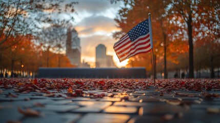 Ground Zero Memorial with an American flag and the autumn foliage creating a serene atmosphere