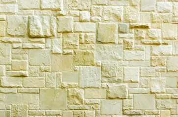 Background Wall Texture covered with natural stone fragments with an attractive texture.