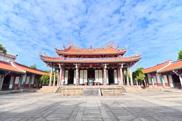 Fototapeta premium Taiwan - Jan 17, 2024: The Dachen Hall, standing in the center of a vast granite courtyard at Taipei Confucius Temple, houses the plaque of Confucius, the revered Sage.