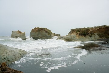 waves hit the cliff, Stormy weather at Waverley Beach