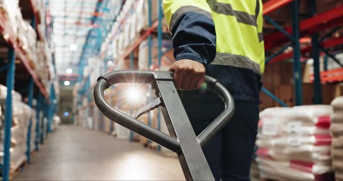 Logistics, hands or worker with trolley in warehouse for package distribution, supply chain or delivery products. Back, inventory or person pulling pallet jack in factory for storage stock or walking