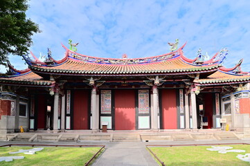Fototapeta premium Daytime view of the Yi Gate (Da Cheng Gate), located in front of the Dacheng Hall at Taipei Confucius Temple. Closed except during ceremonial events.