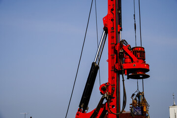 close up of a powerful hydraulic drilling rig at a construction site. Installation of drilled piles by drilling. Pile foundation. Drilling in the ground
