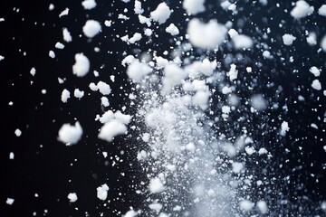 Explosion of snow falling down from sky or roof, heavy big small size snows. Freeze shot on black background isolated. Fluffy White snowflakes splash explode cloud up in mid air storm. Generative Ai