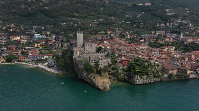 Aerial view of the medieval castle in the town of Malcesine on Lake Garda, Italy on a sunny summer day