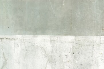 Peeling plaster Wall fragment with scratches and cracks. Grunge wall texture