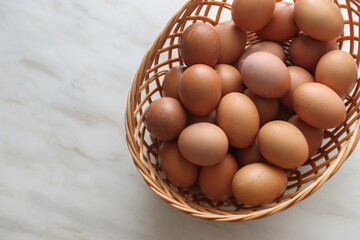 Organic Fresh eggs in basket form top view