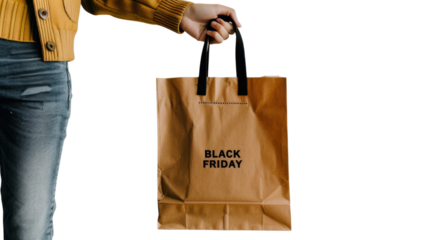 Hand holding a bag with Black friday sale banner isolated on white background
