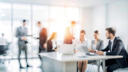 Office Teamwork Blur - Professional office scene with a blurred effect, showcasing teamwork and business development.

