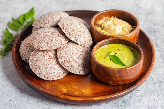 Selective focus of Soft, steamed Idli made from fermented ragi flour, rich in nutrients, perfect for a healthy breakfast.