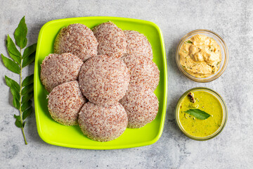 Selective focus of Soft, steamed Idli made from fermented ragi flour, rich in nutrients, perfect for a healthy breakfast.