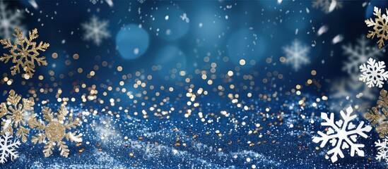 Elegant blue backdrop with sparkling gold sequins and white snowflakes, perfect for a sophisticated Christmas design.