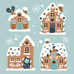 Set of hand drawn gingerbread houses and snowflakes. Snowy winter village icons.  Perfect for sticker or nursery print design.