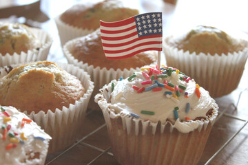 USA American White Cupcakes with Colorful Confetti Sprinkles and Miniature Flag Patriotic Cupcake Toppers