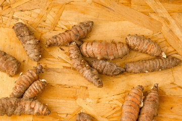 Curcuma longa - Turmeric is a very healthy species in spoon and bowl