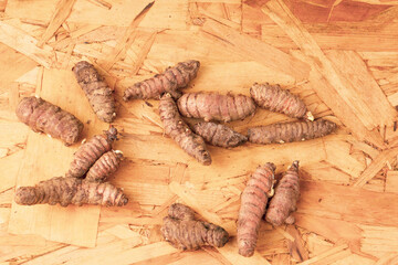 Curcuma longa - Turmeric is a very healthy species in spoon and bowl