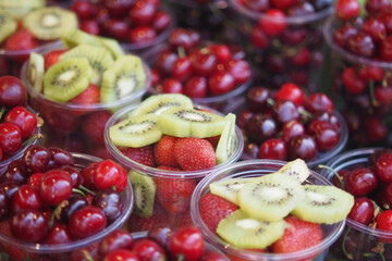 Enjoy our Delicious Fresh Fruit Cups that include Strawberries, Cherries, and delightful Kiwi Slices