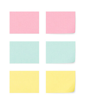 A set of small rectangular sticky notes with shadows. pink, green, yellow