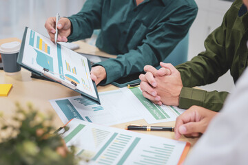 A businessman,embodying strategic leadership, sits at his desk in a modern office, planning and managing departments systematically to ensure organizational success through effective administration