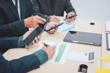 A lawyer meets with clients in a professional office, offering expert legal consultation and representation. Specializing in business planning, they operate within private firms or as freelance