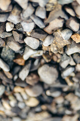 An upside down closeup of rocks on a beach