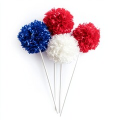 Four decorative pom-poms in red, white, and blue on sticks.