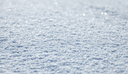 Shiny snow surface on a sunny winter day, natural background photo