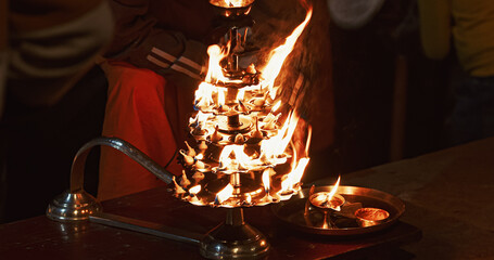 Varanasi, Uttar Pradesh, India. Candle Holder With Lit Candles On Ganga Maha Aarti Ceremony Begins....