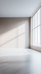 Fototapeta premium Empty room in neutral colors with ample copyspace, a large window filling the room with natural lighting and creating a play between daylight and shadows.