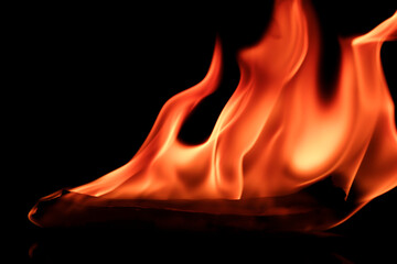A photo of a flame moving in a wave pattern.