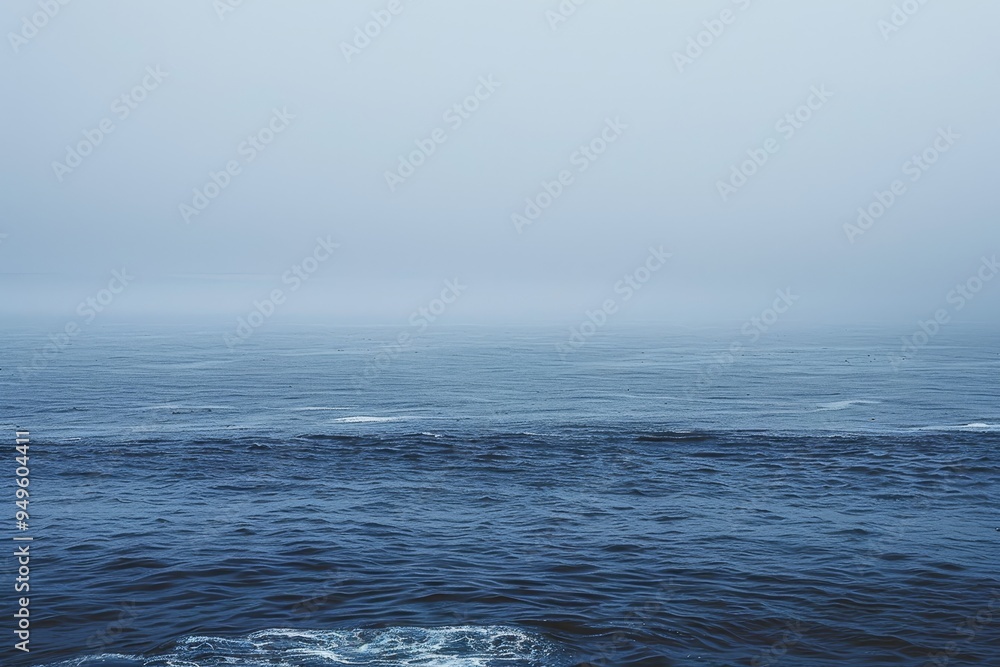 Poster a vast body of water stretches under a cloudy sky, creating a serene and atmospheric scene, subtle v