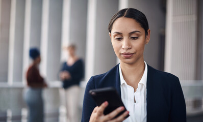 Woman, cellphone and notification in city for business, networking and app or website. Technology, corporate female person and online in street for connectivity, communication and email for work