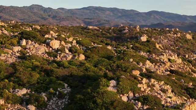 Prehistoric Rock Park In Asia. Aerial Pan Across Rock, Stones, And Boulders Decorating The Coastal Mountains Of Nui Chua Nature Reserve, Ninh Thuan Coastal Province, Vietnam.