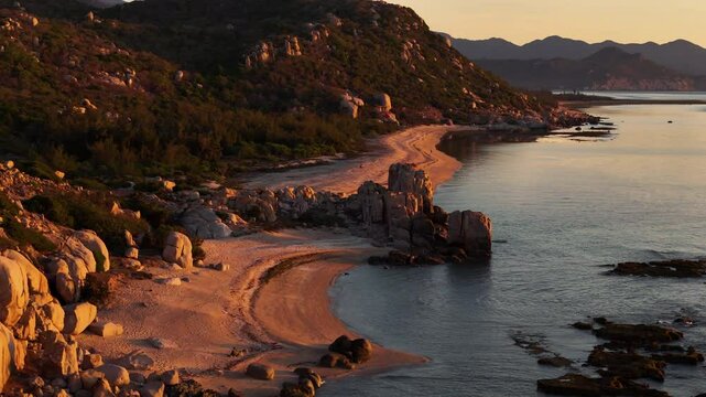 Slow Aerial Descend Over An Idyllic Beach Sunset In Vinh Hy Bay, Vietnam; Beautiful, Untouched, Unspoiled, Coastal Landscape.