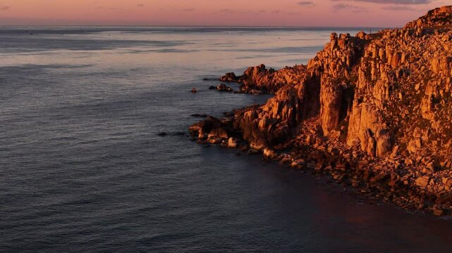 Aerial Sunset Flyby: Spectacular Rock Formations Along The Idyllic Sea Coast Of Vinh Hy Bay, Ninh Thuan, Vietnam.