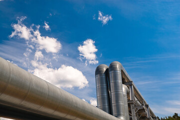 pipeline, blue sky and clouds in the background