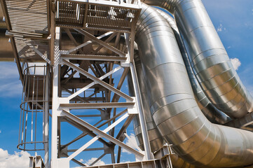 pipeline, blue sky and clouds in the background
