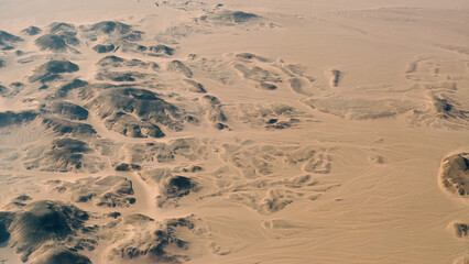 view from the plane window of the desert in Egypt